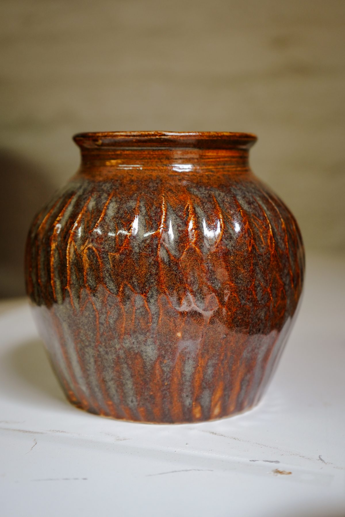 A glazed, finished jar made at the studio