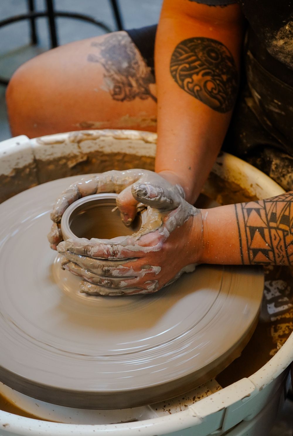 Shaping the belly of a bowl on the wheel