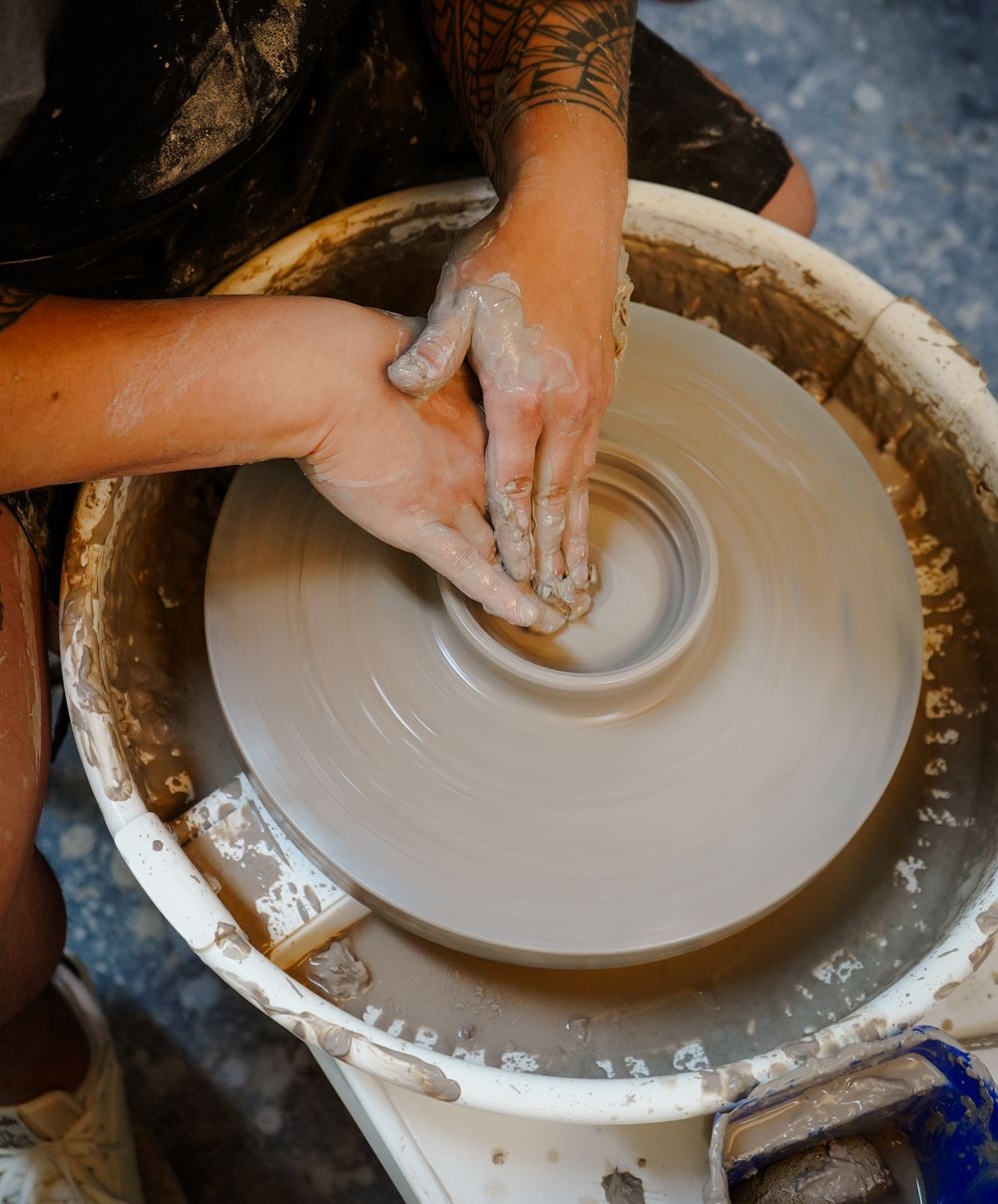 Top-down view of a form being thrown on the wheel