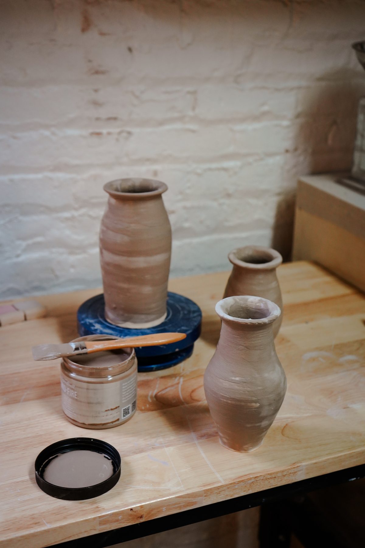 Greenware pots waiting to be bisque fired